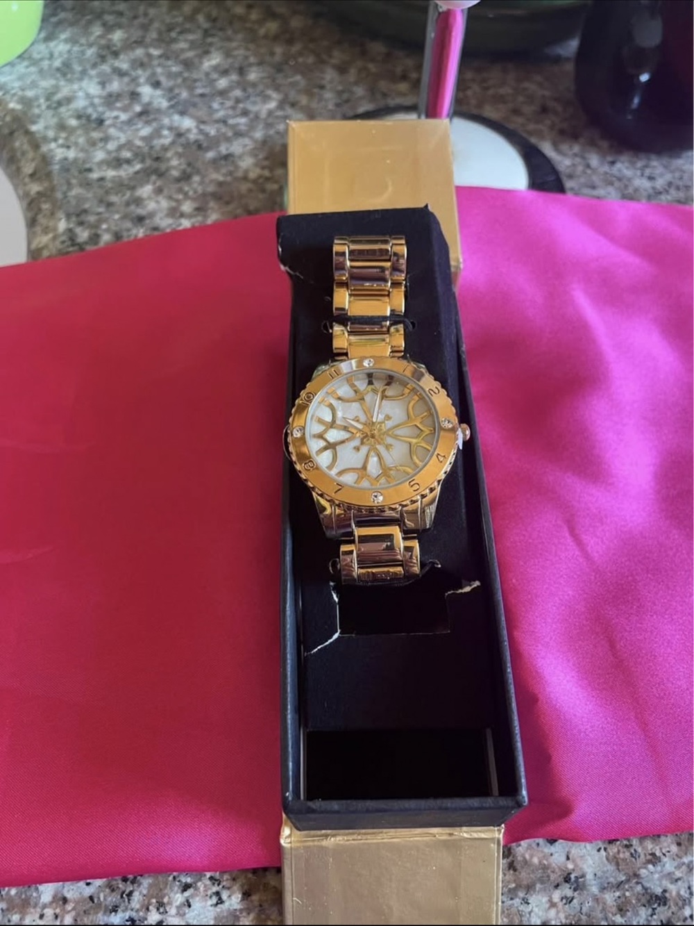 Avon Two-Tone Gold and Silver Women's Watch with Patterned Face